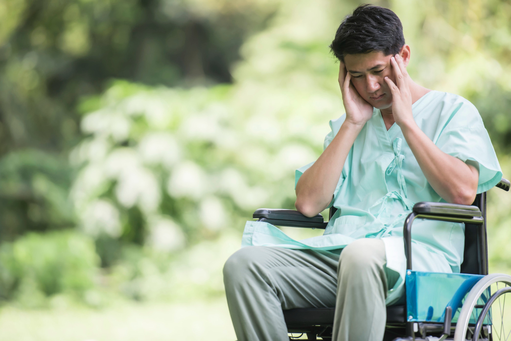 alone-young-disabled-man-wheelchair-garden.jpg