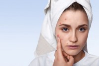 portrait-young-woman-having-problem-skin-pimple-her-cheek-wearing-towel-her-head-having-sad-expression-pointing_176532-9979_58_20200902115320.jpg