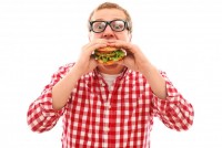 guy-eating-a-burger-holding-with-both-hands.jpg