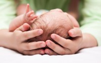 little-baby-held-in-someones-hands.jpg