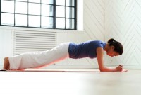 young-woman-practicing-yoga-yoga-mat.jpg